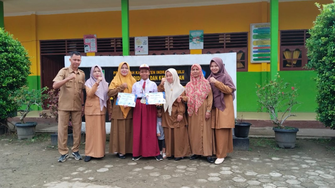 Kharen Marissa Ruly, Siswi SDN 002 Usul Raih Dua Gelar Juara di Kejuaraan Karate Kids 2 Riau Open 2025